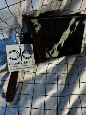 Countryside Co. Black & White Cowhide Wristlet